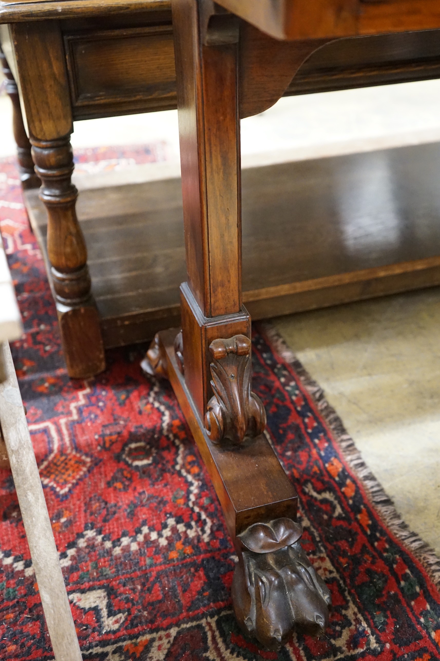 A Victorian rosewood centre table, width 122cm, depth 48cm, height 70cm